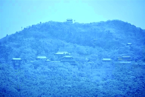 从14个小时以来的降雪量数据看,济南降雪量排在全省第三位记者王晓峰摄